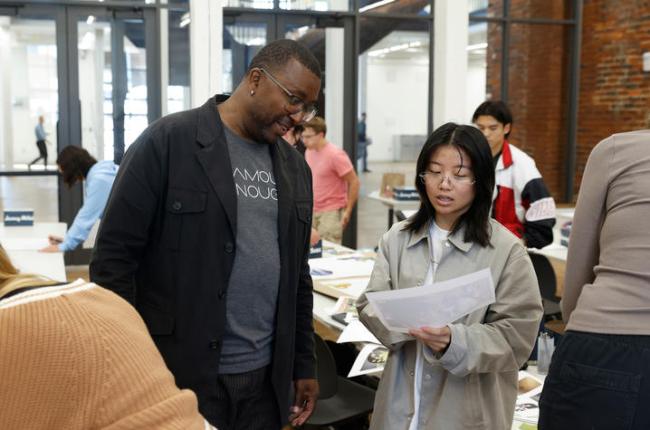 Ronnie Wright, VP of Design at Nike, works with a student. Mark Cornelison | UK Photo