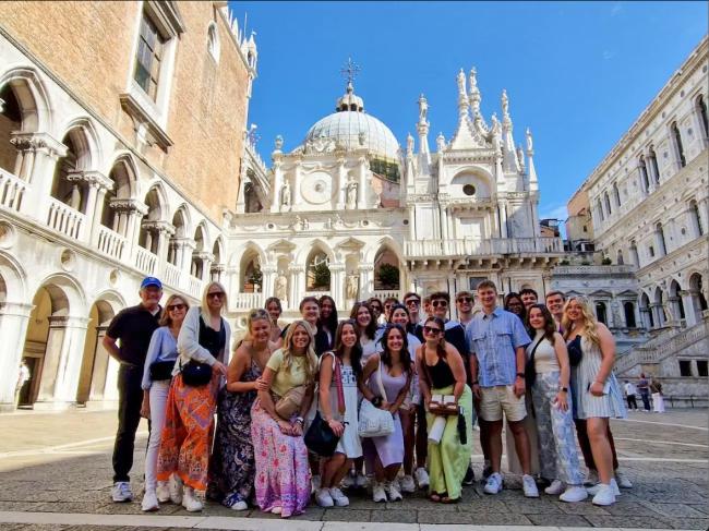 The group takes a photo