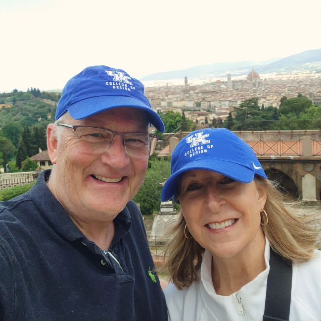 Mark and Mary Lee O'Bryan wearing UK ball caps in Florence.