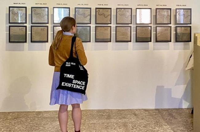 An onlooker observes “Continuous Recovery” on display at the “Time Space Existence” exhibition in Venice, Italy. Photo by Rebekah Radtke.
