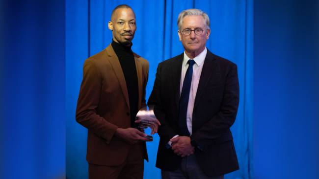 Montréale Jones receives the 2025 LTJ Torch of Excellence Award presented by Dean Ned Crankshaw at the 2025 LTJ Luncheon on Oct. 17. Photo by Breven Walker.