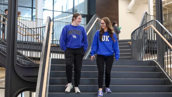 Students walking down staircase